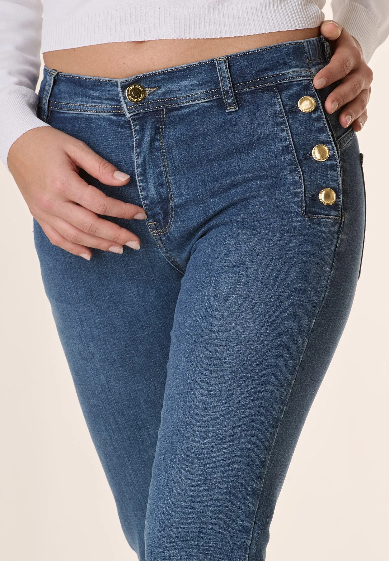 Jeans bottoni dorati denim stretch